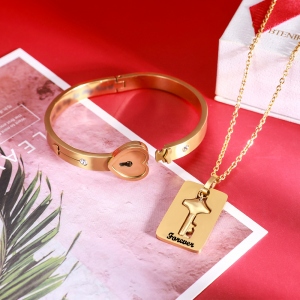 Bracciale e collana chiave personalizzati per coppia in oro